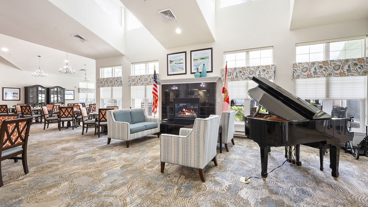 A cozy fireplace lounge at Orchard Heights